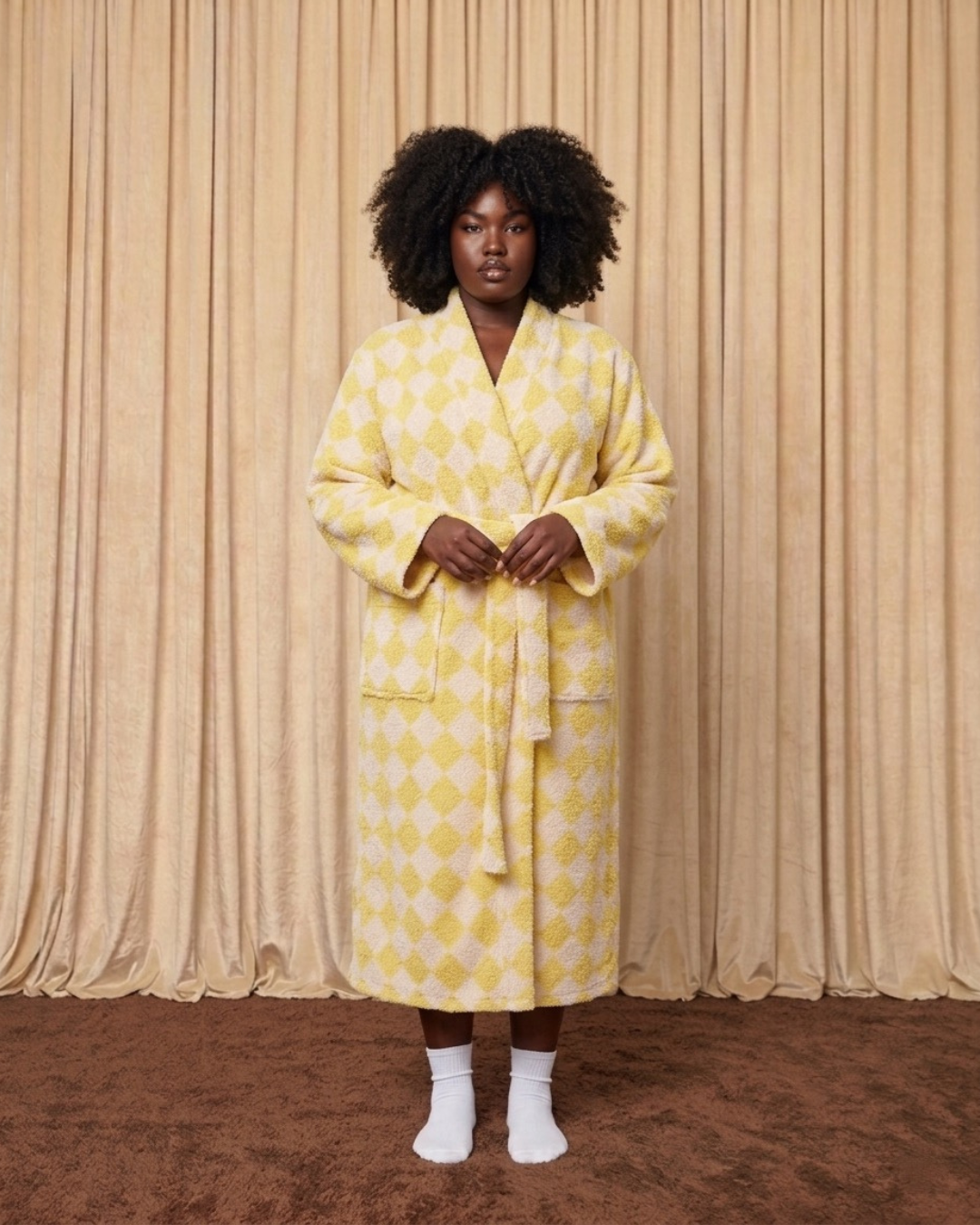 Model wearing a yellow diamond patterned cotton terry robe