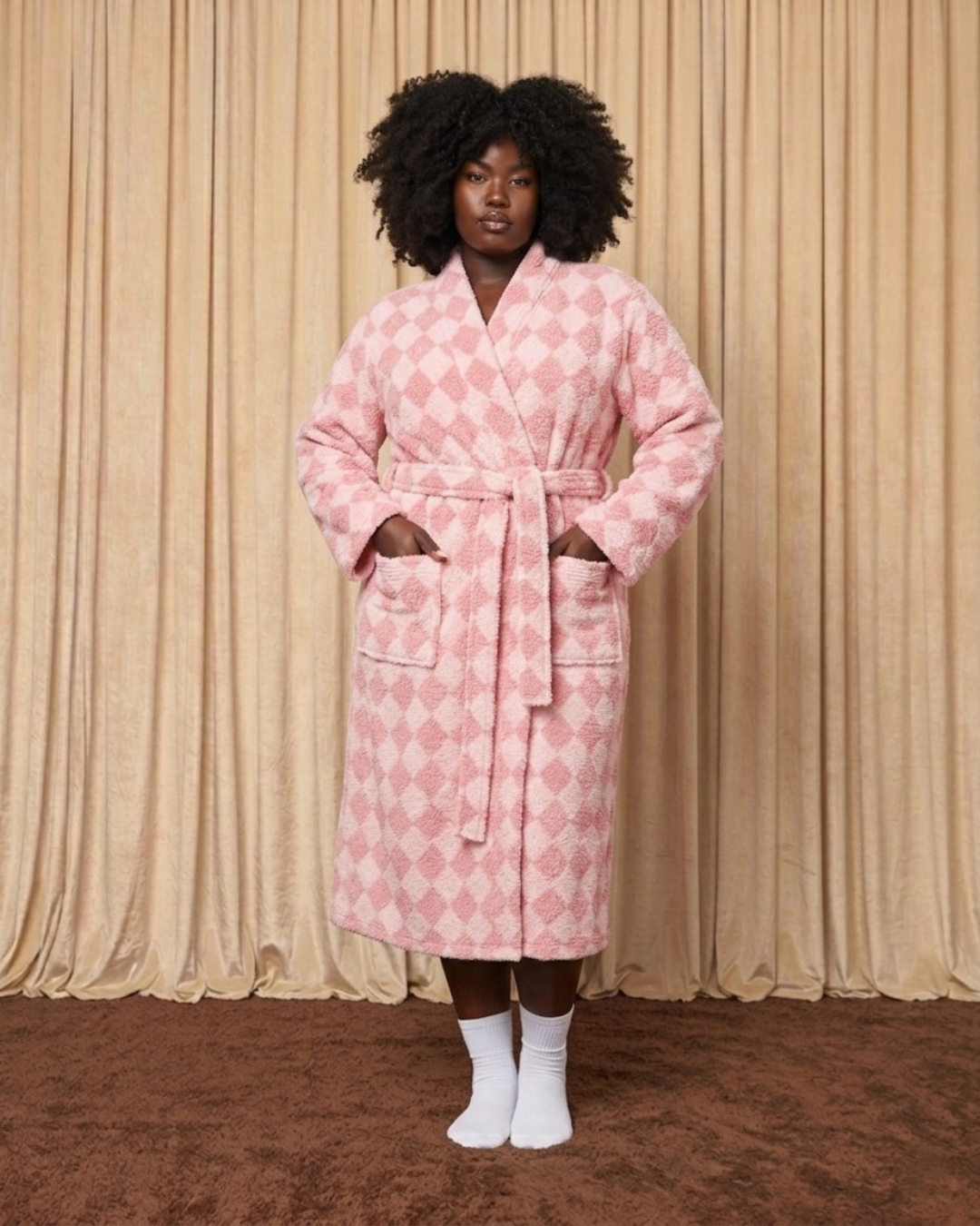 Model wearing a pink diamond patterned cotton terry robe